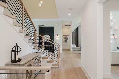 Step into luxury in this stunning Carrington Homes custom estate on Chatham Hills Golf Course in Indiana - for sale on GolfHomes.com, golf home, golf lot
