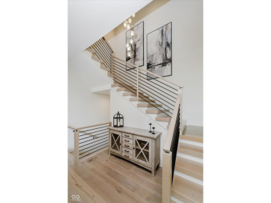 Step into luxury in this stunning Carrington Homes custom estate on Chatham Hills Golf Course in Indiana - for sale on GolfHomes.com, golf home, golf lot