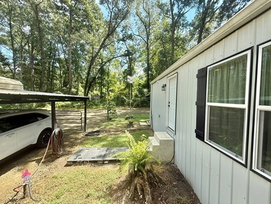 This stunning 2-bedroom, 2-bath partially furnished manufactured on Pendleton Harbor in Texas - for sale on GolfHomes.com, golf home, golf lot