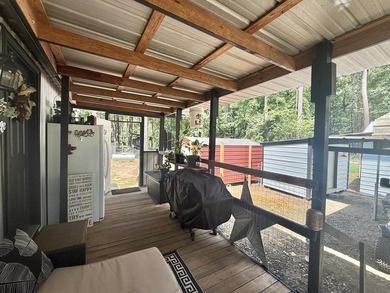 This stunning 2-bedroom, 2-bath partially furnished manufactured on Pendleton Harbor in Texas - for sale on GolfHomes.com, golf home, golf lot