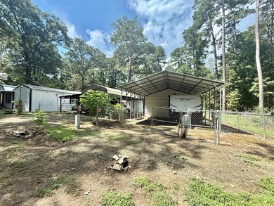 This stunning 2-bedroom, 2-bath partially furnished manufactured on Pendleton Harbor in Texas - for sale on GolfHomes.com, golf home, golf lot