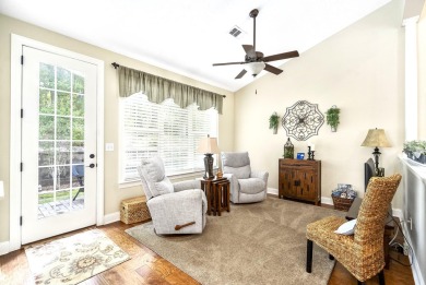 Soaring high ceilings, the inviting openness and hardwood floors on Woodside Plantation Country Club in South Carolina - for sale on GolfHomes.com, golf home, golf lot