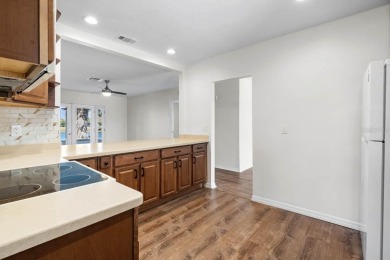 Nestled on a serene cul-de-sac with picturesque lake views, this on Caloosa Greens Executive Golf Course in Florida - for sale on GolfHomes.com, golf home, golf lot