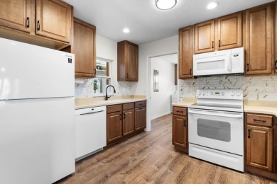 Nestled on a serene cul-de-sac with picturesque lake views, this on Caloosa Greens Executive Golf Course in Florida - for sale on GolfHomes.com, golf home, golf lot