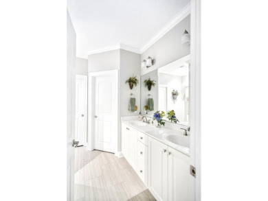 Soaring high ceilings, the inviting openness and hardwood floors on Woodside Plantation Country Club in South Carolina - for sale on GolfHomes.com, golf home, golf lot