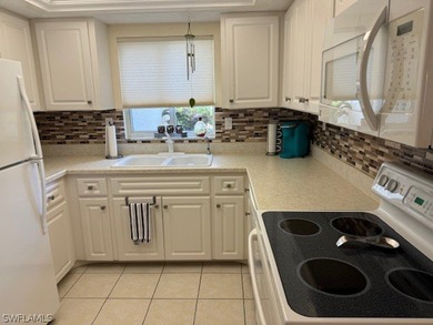 SUPER value and SUPER convenient! This first-floor 2-bedroom on The Landings Yacht, Golf and Tennis Club in Florida - for sale on GolfHomes.com, golf home, golf lot