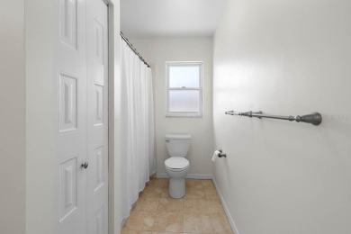 Nestled on a serene cul-de-sac with picturesque lake views, this on Caloosa Greens Executive Golf Course in Florida - for sale on GolfHomes.com, golf home, golf lot