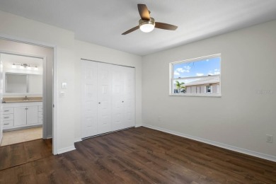 Nestled on a serene cul-de-sac with picturesque lake views, this on Caloosa Greens Executive Golf Course in Florida - for sale on GolfHomes.com, golf home, golf lot