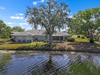 Nestled on a serene cul-de-sac with picturesque lake views, this on Caloosa Greens Executive Golf Course in Florida - for sale on GolfHomes.com, golf home, golf lot