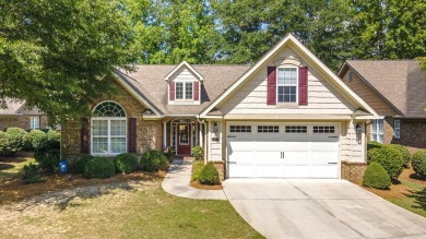 Soaring high ceilings, the inviting openness and hardwood floors on Woodside Plantation Country Club in South Carolina - for sale on GolfHomes.com, golf home, golf lot