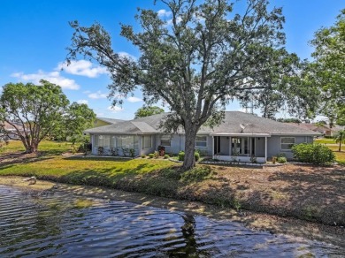 Nestled on a serene cul-de-sac with picturesque lake views, this on Caloosa Greens Executive Golf Course in Florida - for sale on GolfHomes.com, golf home, golf lot