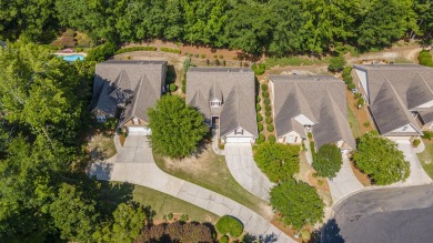 Soaring high ceilings, the inviting openness and hardwood floors on Woodside Plantation Country Club in South Carolina - for sale on GolfHomes.com, golf home, golf lot