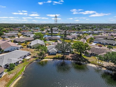 Nestled on a serene cul-de-sac with picturesque lake views, this on Caloosa Greens Executive Golf Course in Florida - for sale on GolfHomes.com, golf home, golf lot