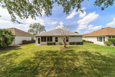 Great house-great location-great price.  Not too big, not too on Eagle Ridge At Spruce Creek Country Club in Florida - for sale on GolfHomes.com, golf home, golf lot