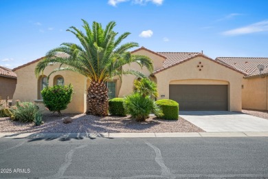 Make this magnificent Treviso model with enchanting water views on Tuscany Falls At Pebble Creek in Arizona - for sale on GolfHomes.com, golf home, golf lot