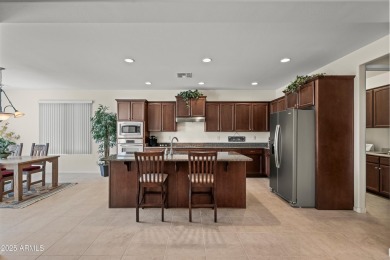 Make this magnificent Treviso model with enchanting water views on Tuscany Falls At Pebble Creek in Arizona - for sale on GolfHomes.com, golf home, golf lot