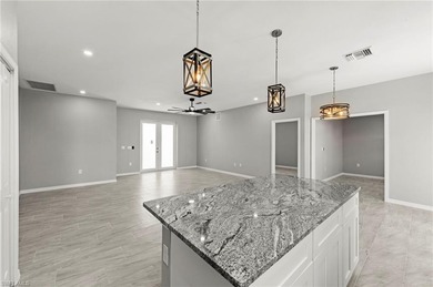 Step into modern Florida living with this brand-new Cape Coral on Burnt Store Golf Club in Florida - for sale on GolfHomes.com, golf home, golf lot