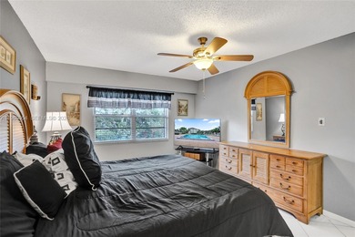 Don't walk but run to this lovely, remodeled 2/2 condo on Flamingo Lakes Country Club in Florida - for sale on GolfHomes.com, golf home, golf lot