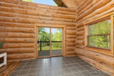 The ''Cabin'' is your opportunity to own a spacious, yet cozy on Centennial Acres Golf Club in Michigan - for sale on GolfHomes.com, golf home, golf lot