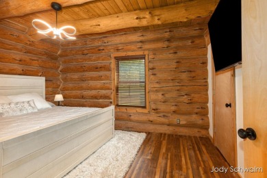 The ''Cabin'' is your opportunity to own a spacious, yet cozy on Centennial Acres Golf Club in Michigan - for sale on GolfHomes.com, golf home, golf lot