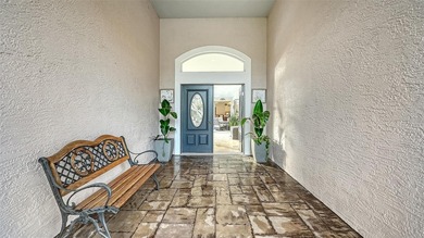 Gorgeous and unique courtyard pool home offering spectacular on University Park Country Club in Florida - for sale on GolfHomes.com, golf home, golf lot