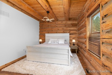 The ''Cabin'' is your opportunity to own a spacious, yet cozy on Centennial Acres Golf Club in Michigan - for sale on GolfHomes.com, golf home, golf lot