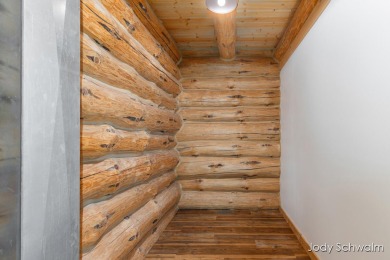 The ''Cabin'' is your opportunity to own a spacious, yet cozy on Centennial Acres Golf Club in Michigan - for sale on GolfHomes.com, golf home, golf lot