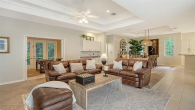 Gorgeous and unique courtyard pool home offering spectacular on University Park Country Club in Florida - for sale on GolfHomes.com, golf home, golf lot