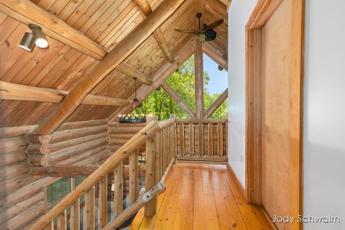 The ''Cabin'' is your opportunity to own a spacious, yet cozy on Centennial Acres Golf Club in Michigan - for sale on GolfHomes.com, golf home, golf lot