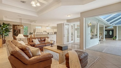 Gorgeous and unique courtyard pool home offering spectacular on University Park Country Club in Florida - for sale on GolfHomes.com, golf home, golf lot