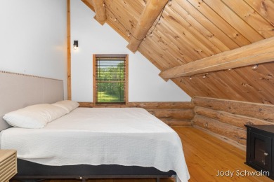 The ''Cabin'' is your opportunity to own a spacious, yet cozy on Centennial Acres Golf Club in Michigan - for sale on GolfHomes.com, golf home, golf lot