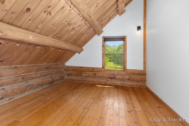 The ''Cabin'' is your opportunity to own a spacious, yet cozy on Centennial Acres Golf Club in Michigan - for sale on GolfHomes.com, golf home, golf lot