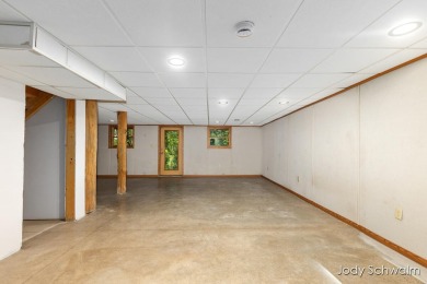 The ''Cabin'' is your opportunity to own a spacious, yet cozy on Centennial Acres Golf Club in Michigan - for sale on GolfHomes.com, golf home, golf lot