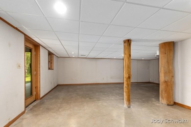The ''Cabin'' is your opportunity to own a spacious, yet cozy on Centennial Acres Golf Club in Michigan - for sale on GolfHomes.com, golf home, golf lot