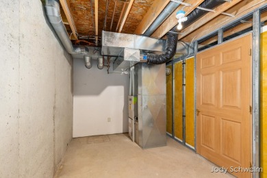 The ''Cabin'' is your opportunity to own a spacious, yet cozy on Centennial Acres Golf Club in Michigan - for sale on GolfHomes.com, golf home, golf lot