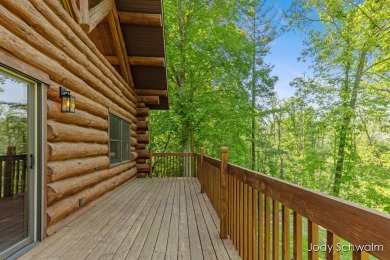 The ''Cabin'' is your opportunity to own a spacious, yet cozy on Centennial Acres Golf Club in Michigan - for sale on GolfHomes.com, golf home, golf lot