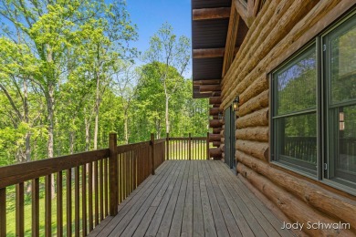 The ''Cabin'' is your opportunity to own a spacious, yet cozy on Centennial Acres Golf Club in Michigan - for sale on GolfHomes.com, golf home, golf lot