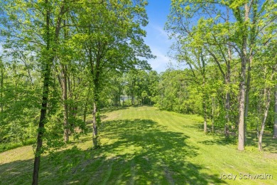 The ''Cabin'' is your opportunity to own a spacious, yet cozy on Centennial Acres Golf Club in Michigan - for sale on GolfHomes.com, golf home, golf lot