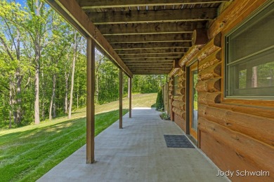 The ''Cabin'' is your opportunity to own a spacious, yet cozy on Centennial Acres Golf Club in Michigan - for sale on GolfHomes.com, golf home, golf lot