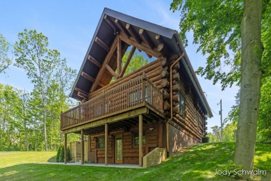 The ''Cabin'' is your opportunity to own a spacious, yet cozy on Centennial Acres Golf Club in Michigan - for sale on GolfHomes.com, golf home, golf lot