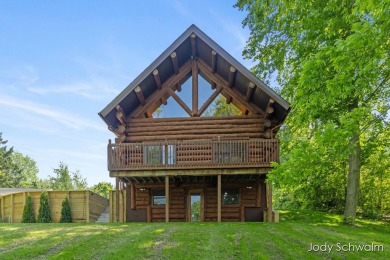 The ''Cabin'' is your opportunity to own a spacious, yet cozy on Centennial Acres Golf Club in Michigan - for sale on GolfHomes.com, golf home, golf lot