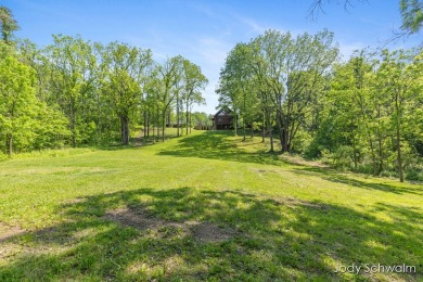 The ''Cabin'' is your opportunity to own a spacious, yet cozy on Centennial Acres Golf Club in Michigan - for sale on GolfHomes.com, golf home, golf lot