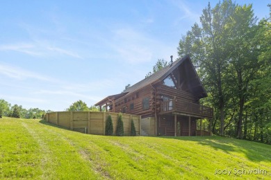 The ''Cabin'' is your opportunity to own a spacious, yet cozy on Centennial Acres Golf Club in Michigan - for sale on GolfHomes.com, golf home, golf lot