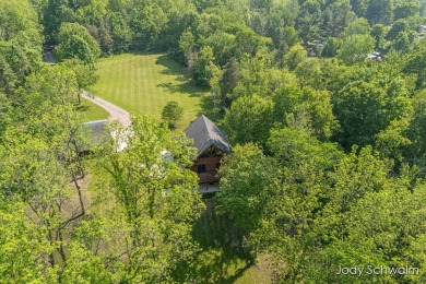 The ''Cabin'' is your opportunity to own a spacious, yet cozy on Centennial Acres Golf Club in Michigan - for sale on GolfHomes.com, golf home, golf lot