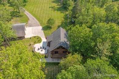 The ''Cabin'' is your opportunity to own a spacious, yet cozy on Centennial Acres Golf Club in Michigan - for sale on GolfHomes.com, golf home, golf lot