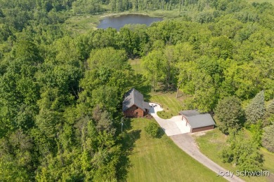 The ''Cabin'' is your opportunity to own a spacious, yet cozy on Centennial Acres Golf Club in Michigan - for sale on GolfHomes.com, golf home, golf lot