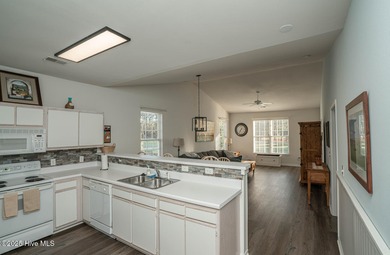 Great view of Piper Golf course in this beautiful and popular on Sandpiper Bay Golf and Country Club in North Carolina - for sale on GolfHomes.com, golf home, golf lot