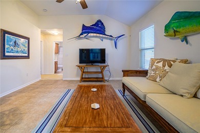 Discover true coastal comfort in this charming 2-bedroom, 2-bath on Rockport Country Club in Texas - for sale on GolfHomes.com, golf home, golf lot