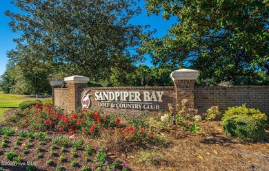 Great view of Piper Golf course in this beautiful and popular on Sandpiper Bay Golf and Country Club in North Carolina - for sale on GolfHomes.com, golf home, golf lot