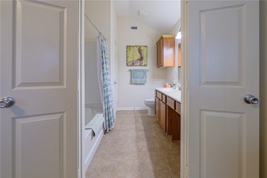 Discover true coastal comfort in this charming 2-bedroom, 2-bath on Rockport Country Club in Texas - for sale on GolfHomes.com, golf home, golf lot